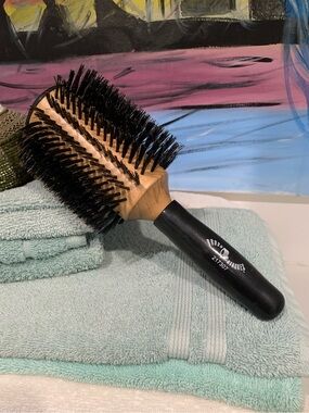 Brush strokes brand Round Bristle Hair Brush. Black Handle, Natural Wood Barrel